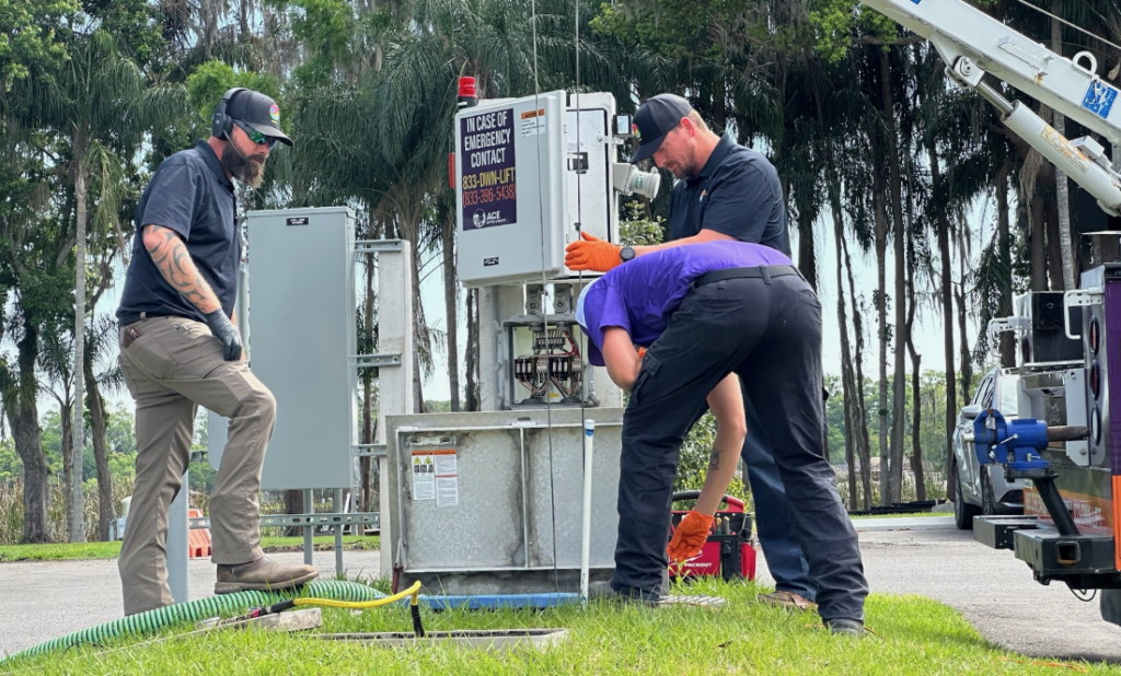A group of workers maintaining a lift station in Hernando, Florida.