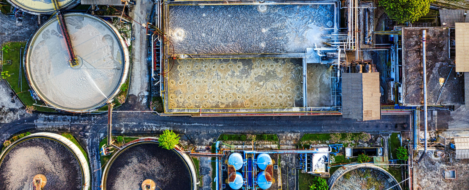 An aerial view of awastewater treatment facility using a SCADA system.