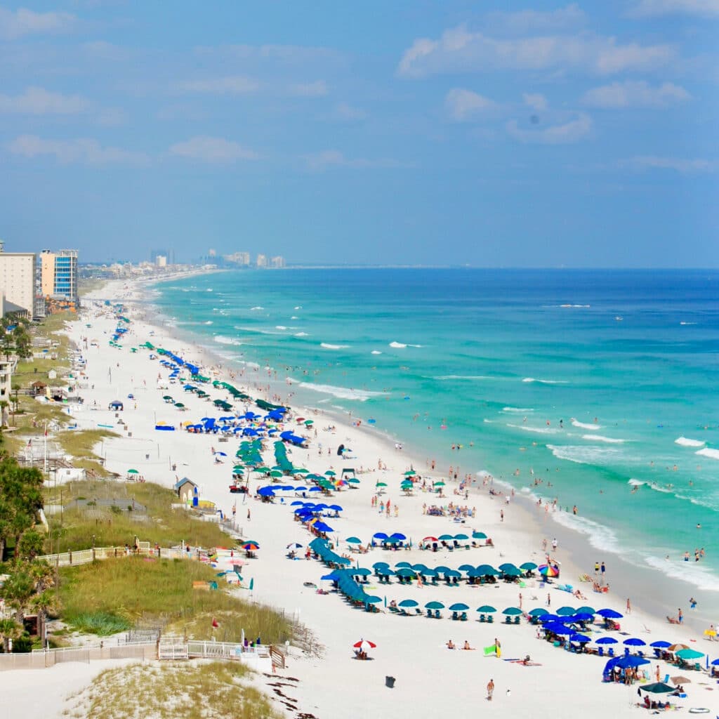 An aerial view of people at a beach in Hernando Beach, Florida.