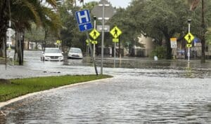 A street in Tampa flooded with storm water from Helene.