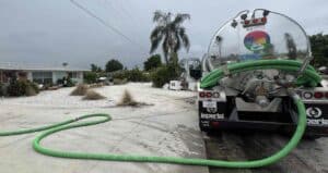 A septic truck doing a pump-out for a resident in Tampa, Florida.