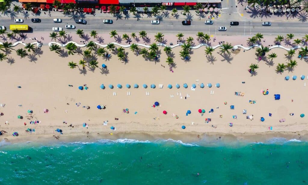 aerial photography of Florida coastline with people on the beach